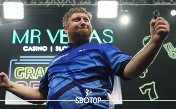 SBOTOP: Cameron Menzies Stuns James Wade to Reach Grand Slam of Darts 2024 Quarter-Finals as Rob Cross Shines in Doubles