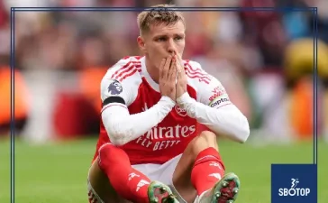 SBOTOP Injury Woes Mount for Arsenal: Martin Ødegaard in Knee Brace and Declan Rice Hurt Despite West Ham Victory