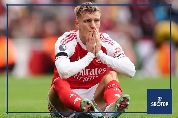SBOTOP Injury Woes Mount for Arsenal: Martin Ødegaard in Knee Brace and Declan Rice Hurt Despite West Ham Victory