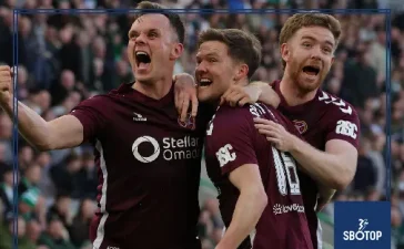 SBOTOP: Hearts Edge Hibernian 2-1 as Blair Spittal’s Late Strike Against Nine Men Sends Visitors Three Points Clear at the Top