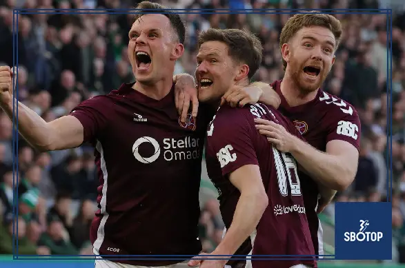 SBOTOP: Hearts Edge Hibernian 2-1 as Blair Spittal’s Late Strike Against Nine Men Sends Visitors Three Points Clear at the Top