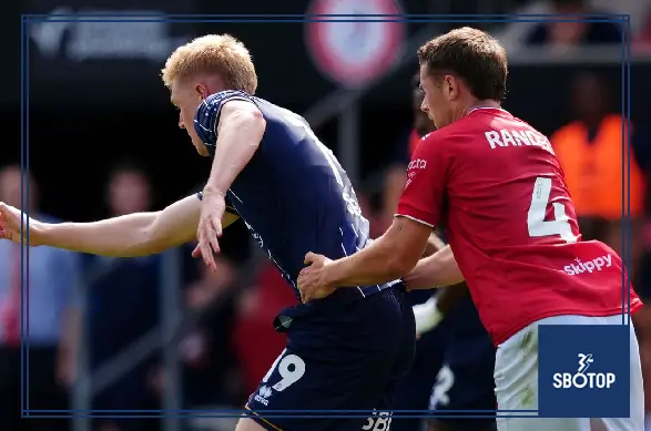 SBOTOP: Josh Coburn’s Brace Powers Millwall to 2-0 Victory as Ten-Man Bristol City Fall to Defeat