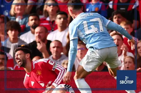 SBOTOP: Howard Webb Backs Phil Foden Red Card While Questioning Bruno Fernandes Decision in Manchester Derby