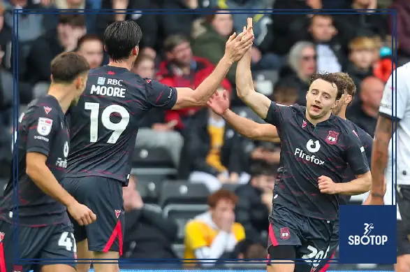 SBOTOP: Rathbone’s Late Intervention Leaves Derby Waiting as Wrexham Salvage Pride Park Point